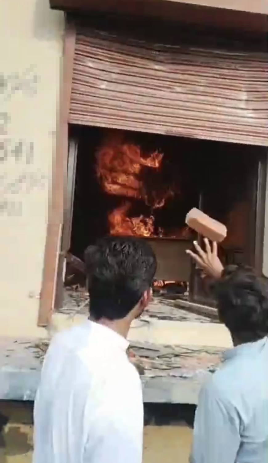 Bricks thrown into the burning clinic in Gharial Kalan, Sheikhupura