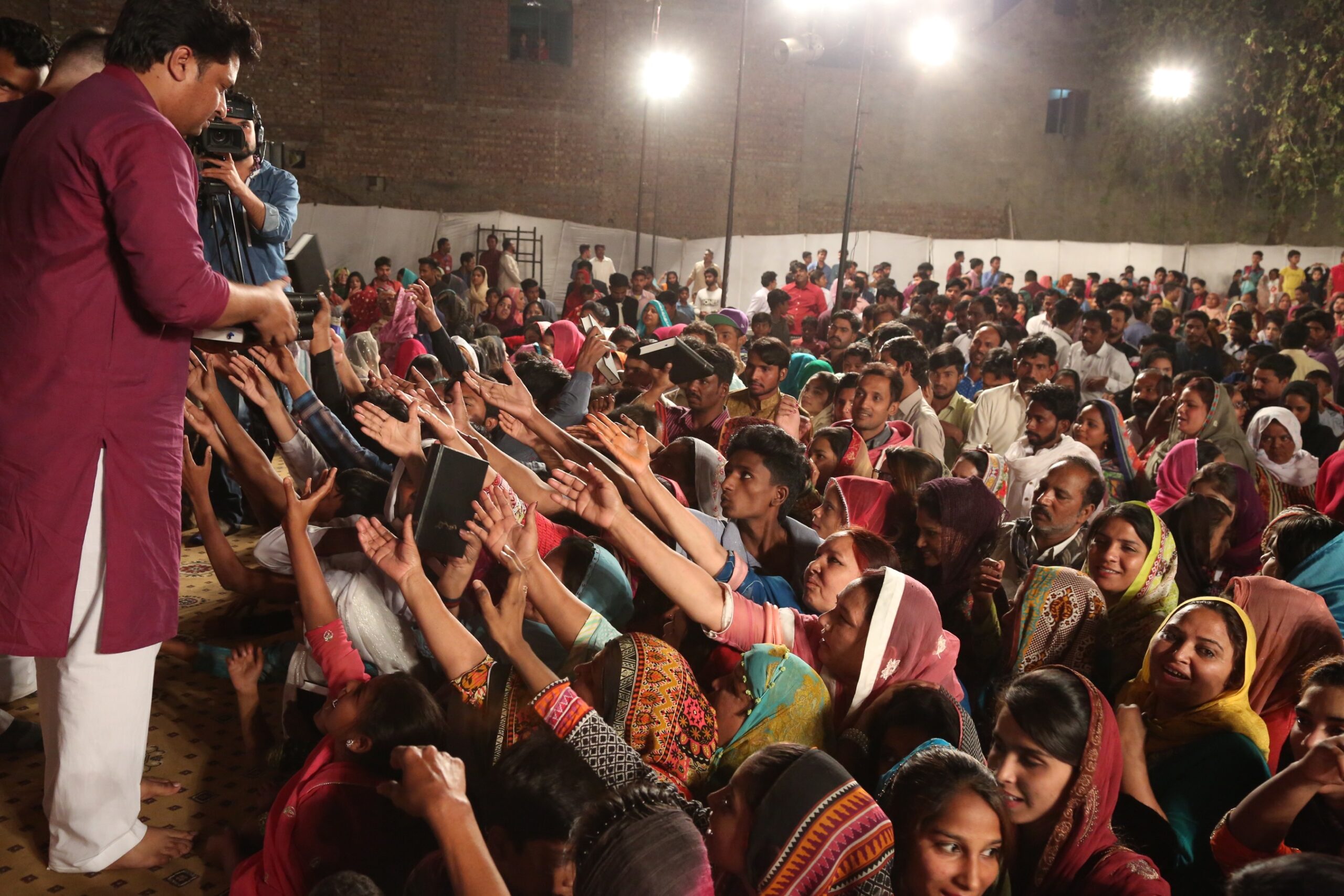 Free Urdu Bibles Distribution in Pakistan During Evangelistic Gospel Crusades.