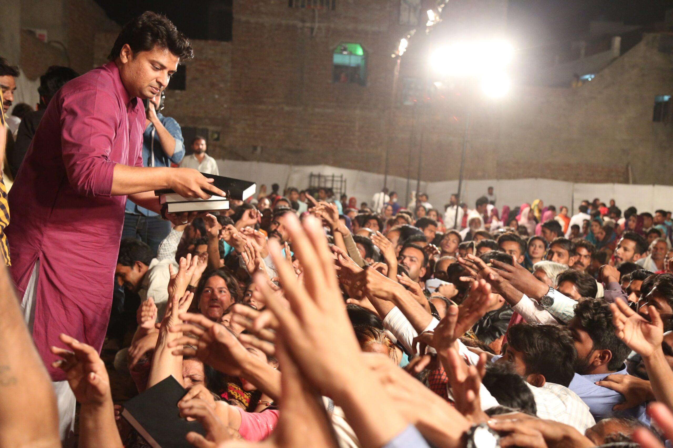 Free Urdu Bibles Distribution in Pakistan During Evangelistic Gospel Crusades.