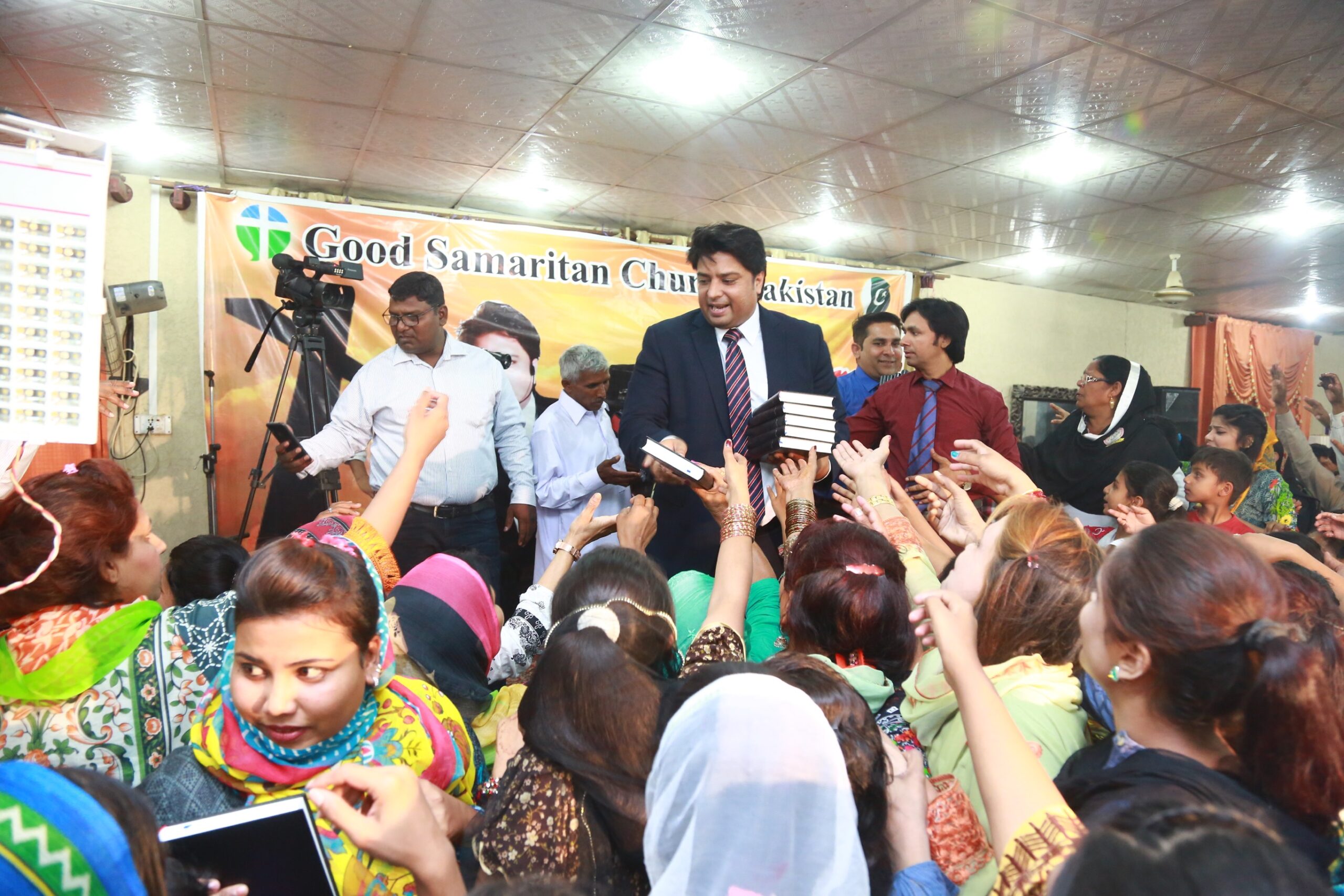 Free Urdu Bibles Distribution in Pakistan During Evangelistic Gospel Crusades.