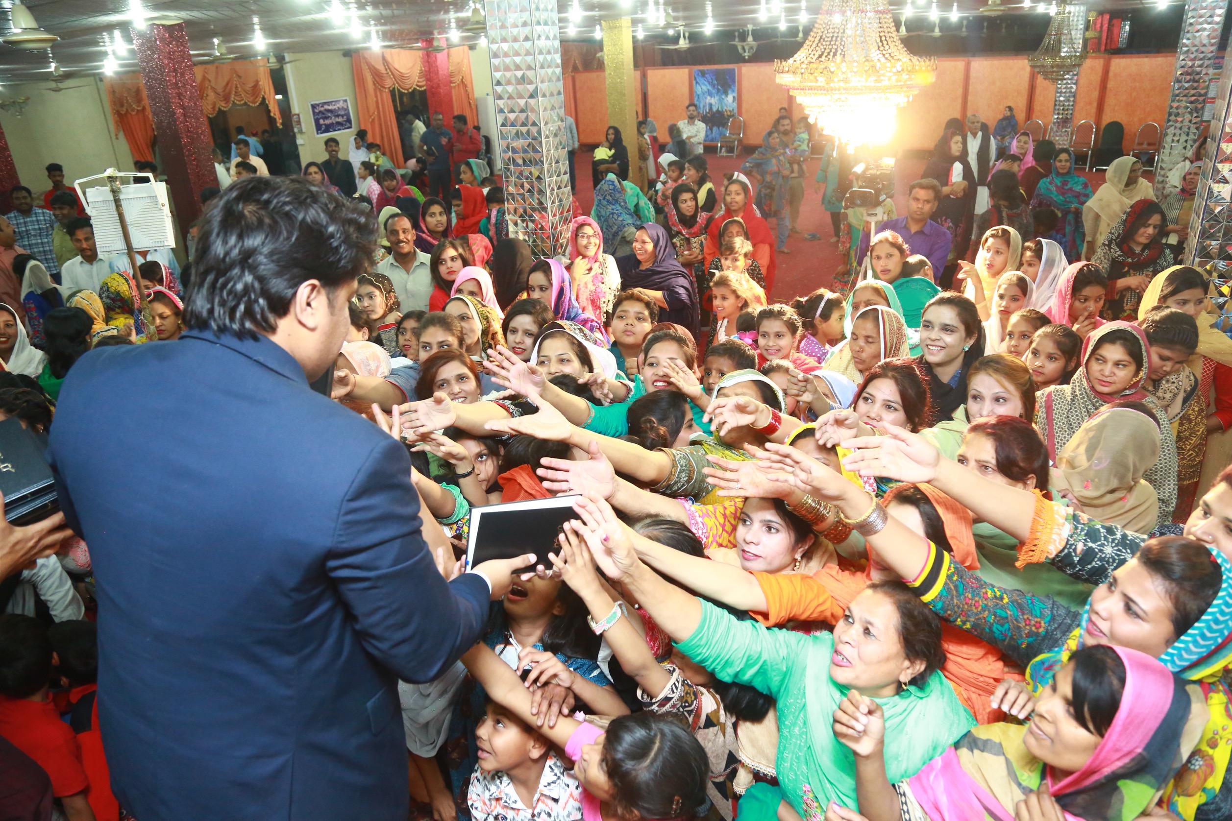 Free Urdu Bibles Distribution in Pakistan During Evangelistic Gospel Crusades.