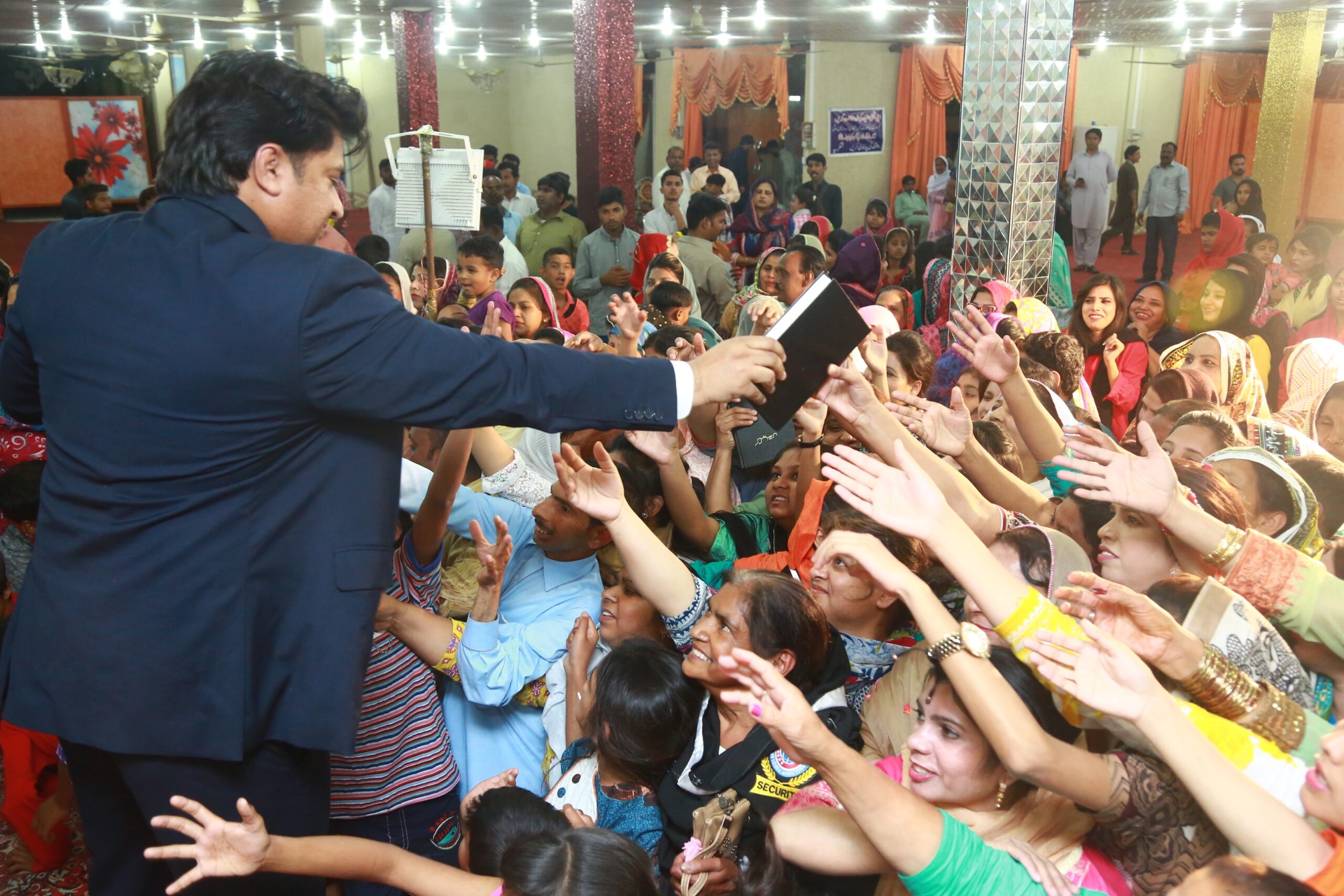 Free Urdu Bibles Distribution in Pakistan During Evangelistic Gospel Crusades.