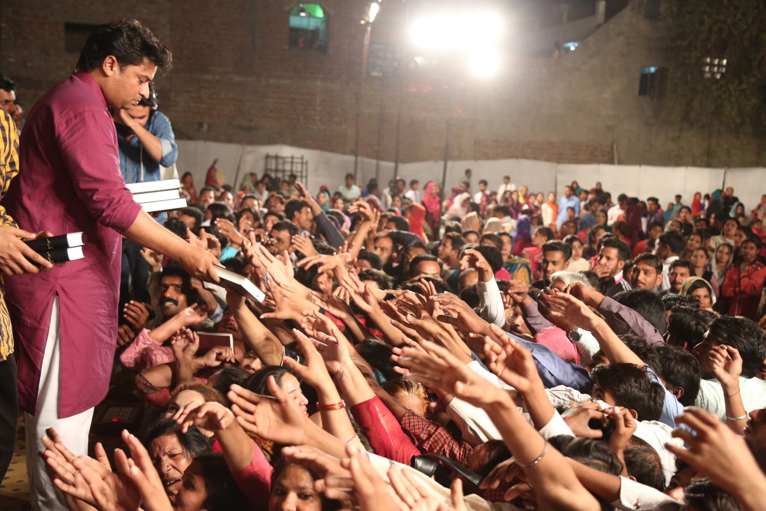 Free Urdu Bibles Distribution in Pakistan During Evangelistic Gospel Crusades.